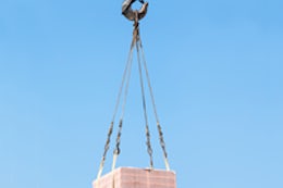 Crane lifting cargo 200x249