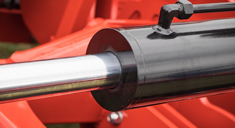 Pistón hidráulico negro de máquina industrial roja