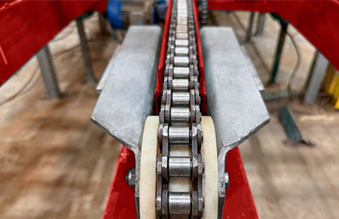 Cadena bien lubricada de volcador de palots