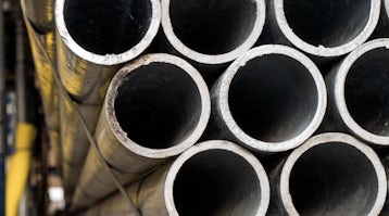 Lubrication of tapered roller bearings in a steel mill