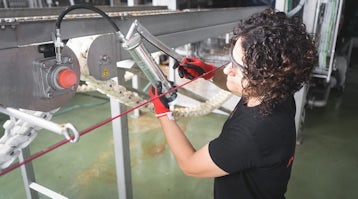 Use of Interflon hand lever grease gun